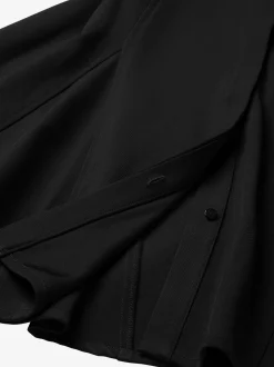 Aansluitende jurk met veter details