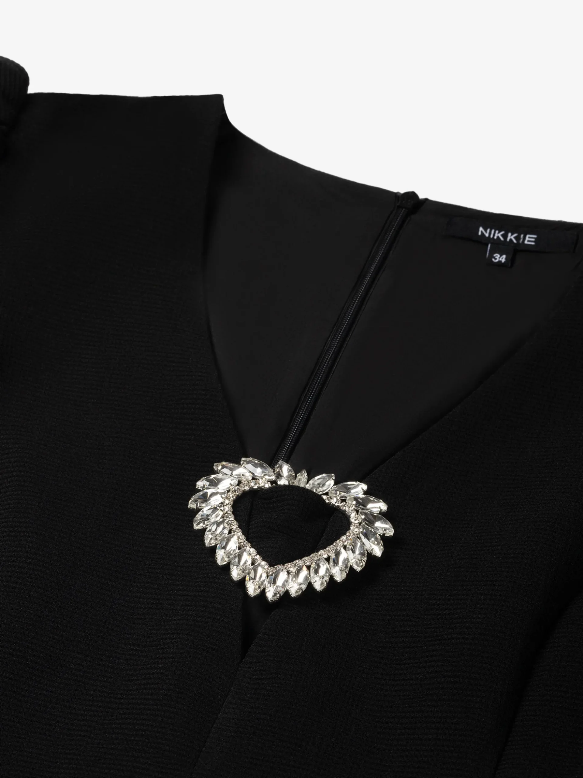 Aansluitende top met pofmouwen en strass detail
