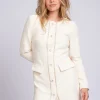 Aansluitende tweed jurk met N-knopen