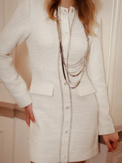 Aansluitende tweed jurk met N-knopen