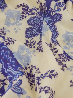 A-lijn jurk met bloemenprint en strikceintuur