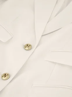 Blazer met N-knopen en dubbele klepzakken