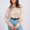 Blouse met stippen en strikkoord
