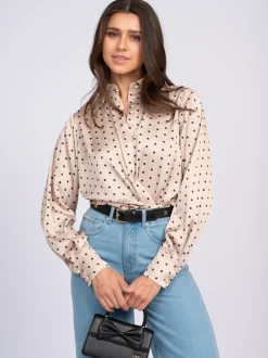 Blouse met stippen en strikkoord