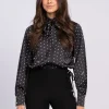 Blouse met stippen en strikkoord