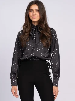 Blouse met stippen en strikkoord