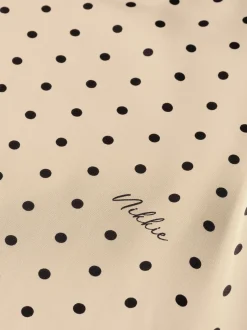 Blouse met stippen en strikkoord