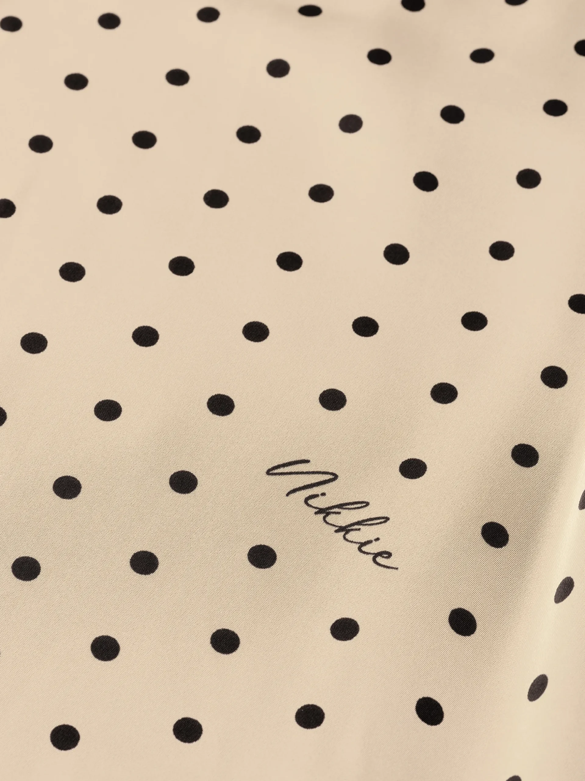 Blouse met stippen en strikkoord