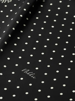 Blouse met stippen en strikkoord