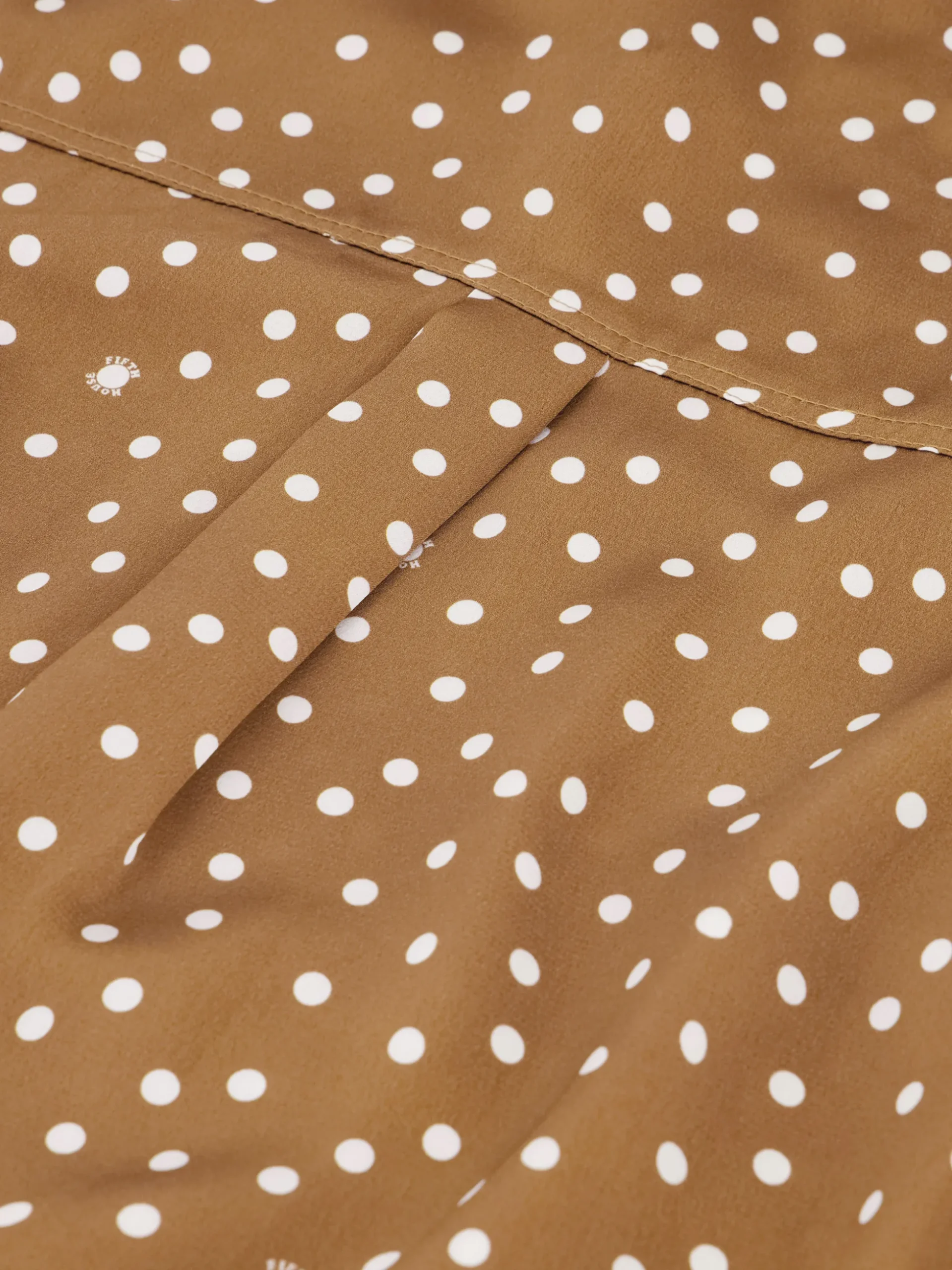 Blouse met stippen en strikkoord