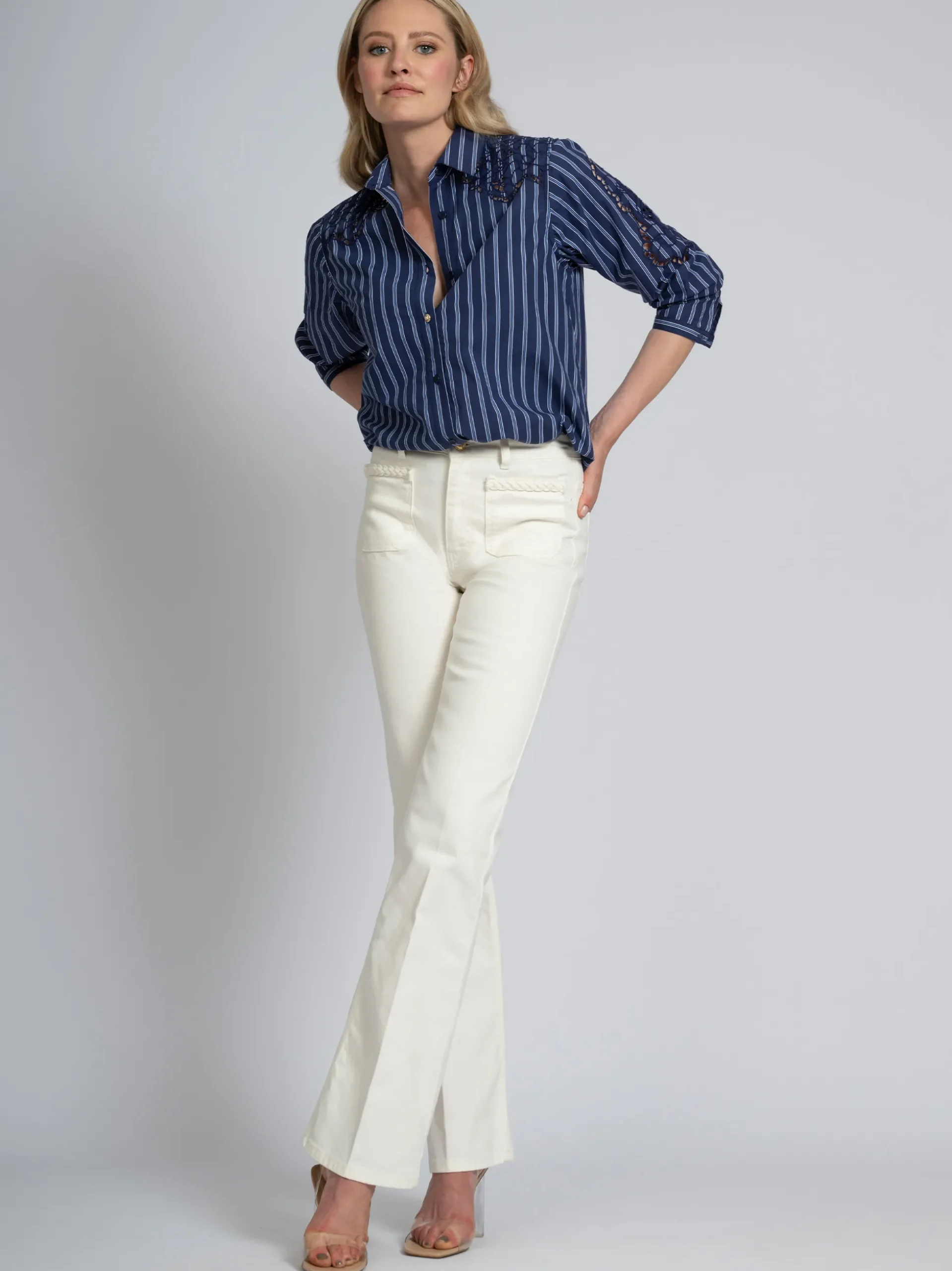 Flared jeans met gevlochten detail bij zakken