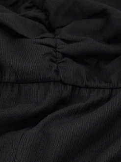 Gedrapeerde jurk met kapmouwtjes en elastische tailleband