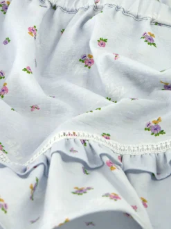 Gelaagde skort met bloemenprint en ruches