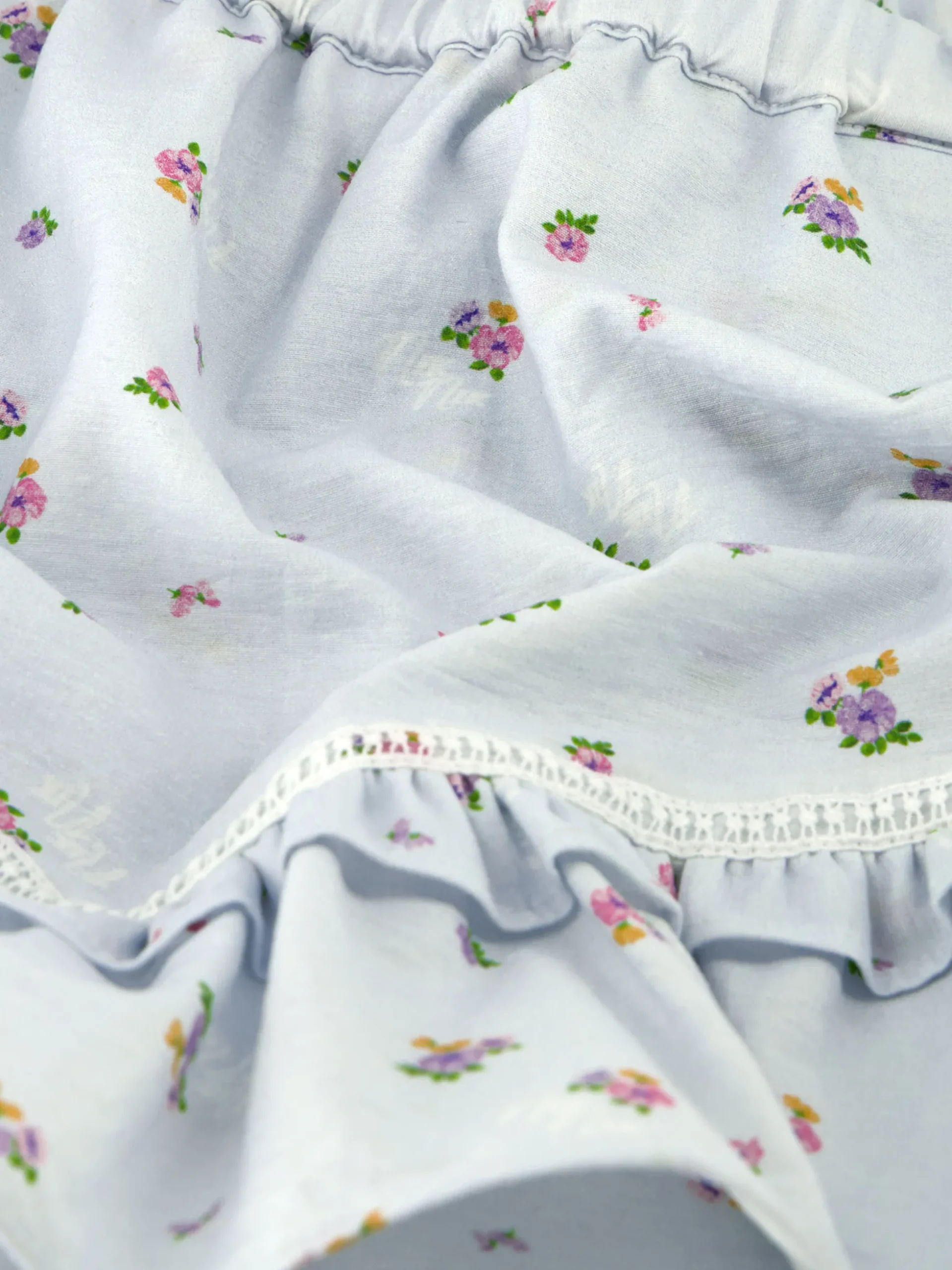 Gelaagde skort met bloemenprint en ruches