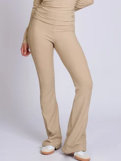 Geribbelde flared legging met omgeslagen taillerand