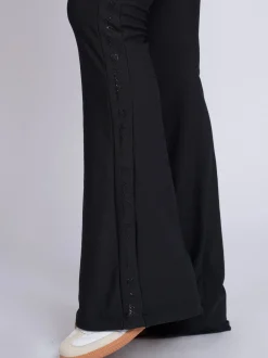 Geribbelde flared legging met omgeslagen taillerand