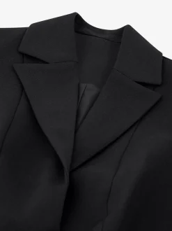 Kort gilet met overslag en N-knopen
