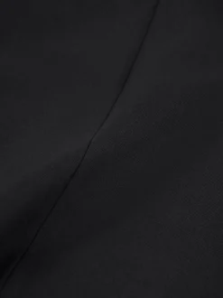 Kort gilet met overslag en N-knopen