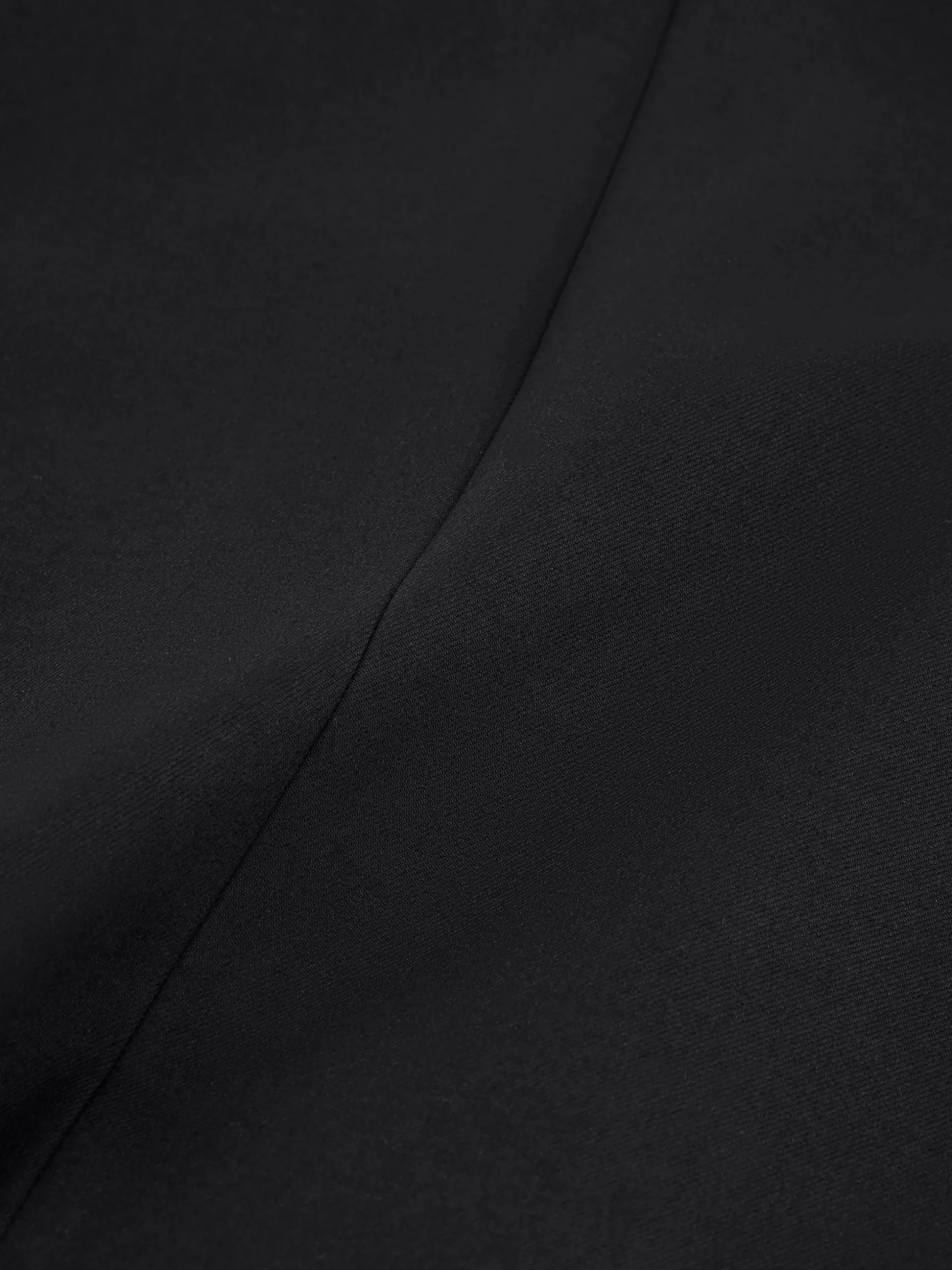 Kort gilet met overslag en N-knopen