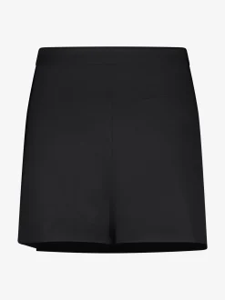 Korte aansluitende skort met een overslag en N-knopen