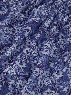 Korte jurk met bloemenprint en kapmouwtjes