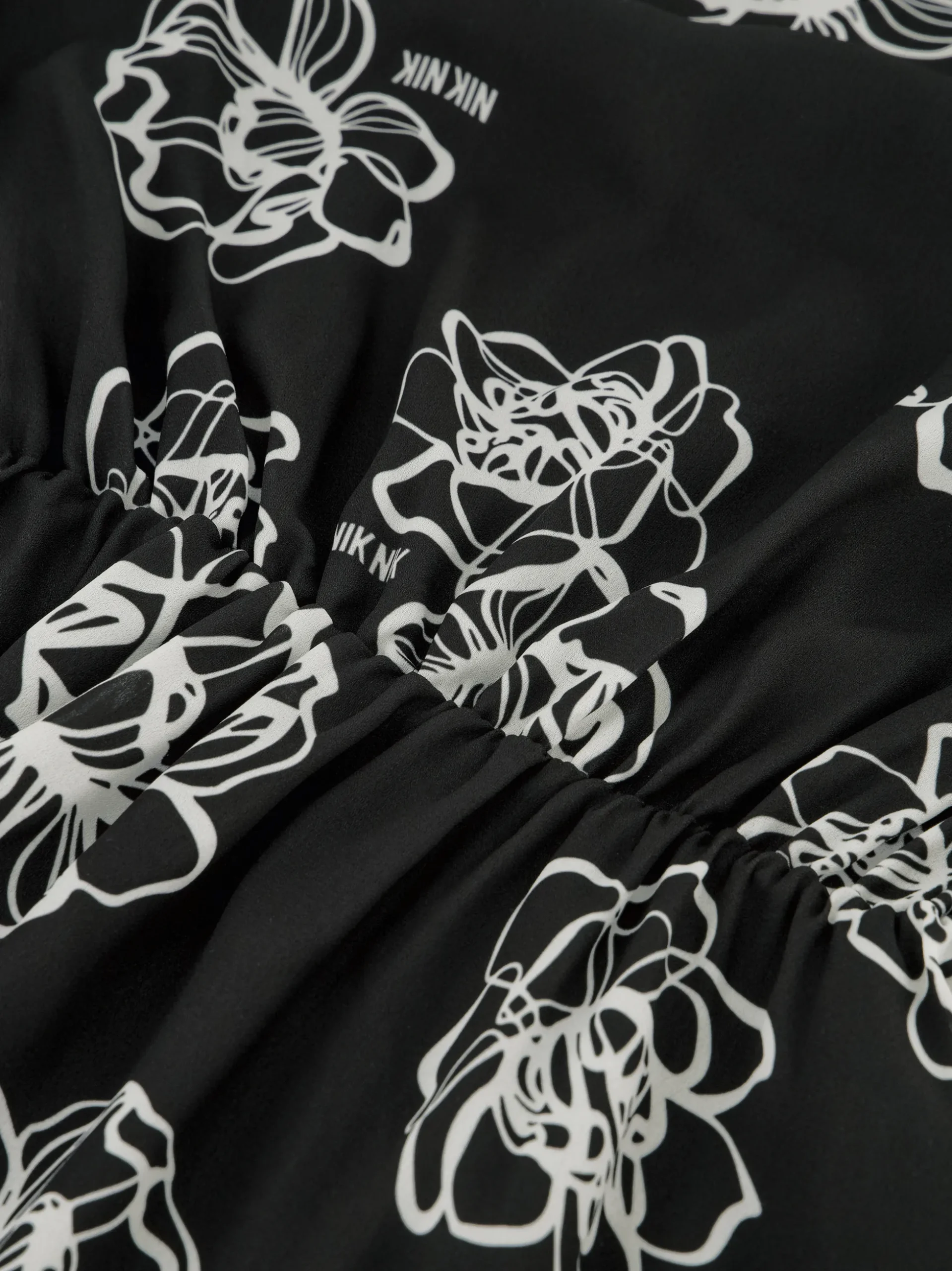Korte jurk met bloemenprint en logo details
