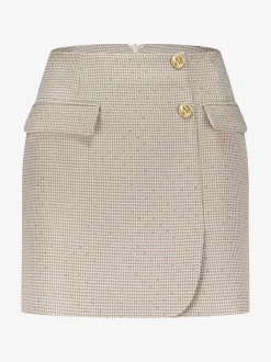 Korte rok met pied-de-poule patroon en strass steentjes