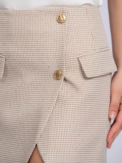 Korte rok met pied-de-poule patroon en strass steentjes