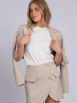 Korte rok met pied-de-poule patroon en strass steentjes