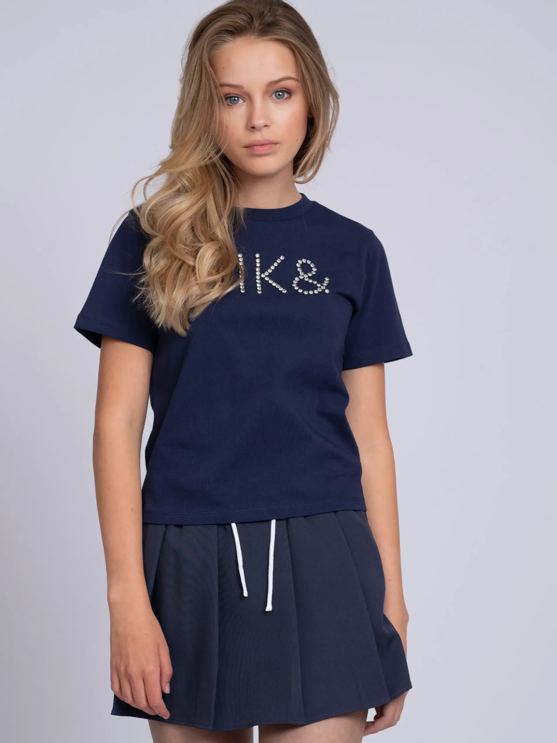 Korte skort met plooien en dubbele tailleband