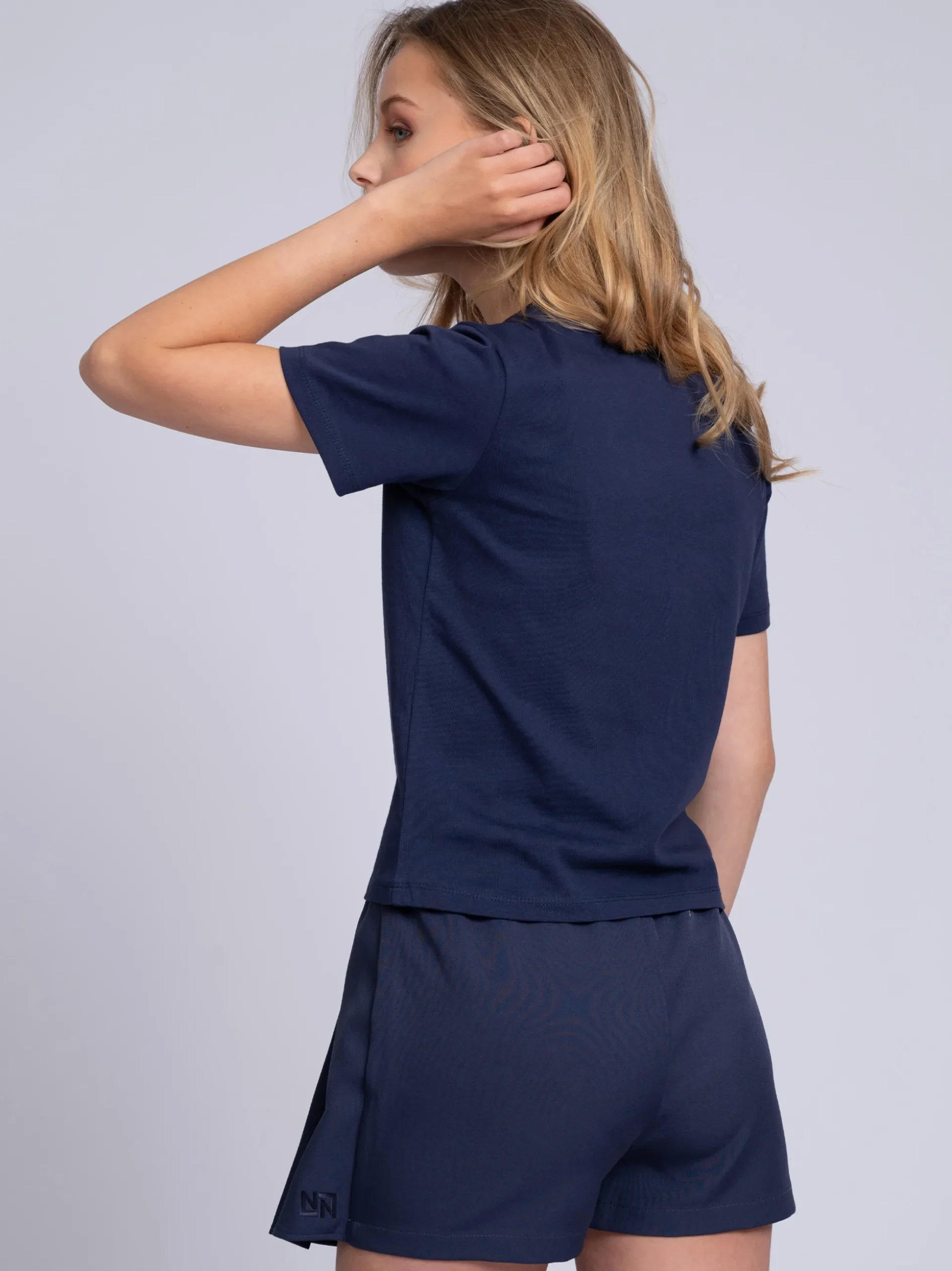 Korte skort met plooien en dubbele tailleband