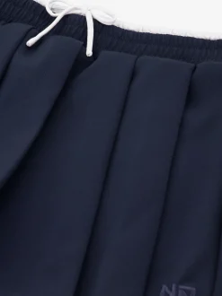 Korte skort met plooien en dubbele tailleband