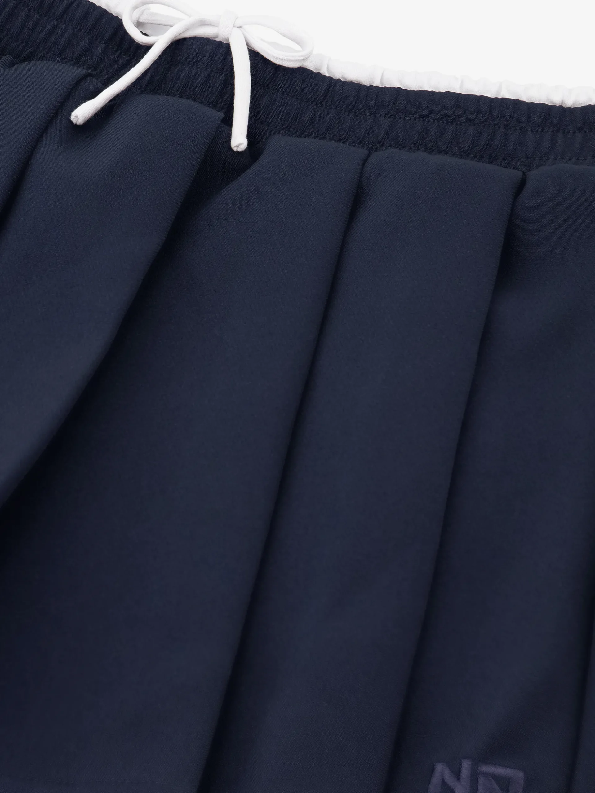 Korte skort met plooien en dubbele tailleband
