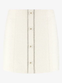 Korte tweed rok met N-knopen en glimmende biezen