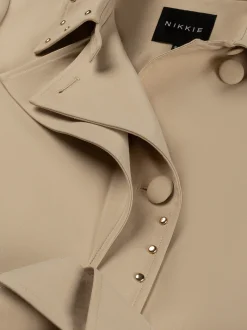 Lange trenchcoat met tweelaags effect en studs