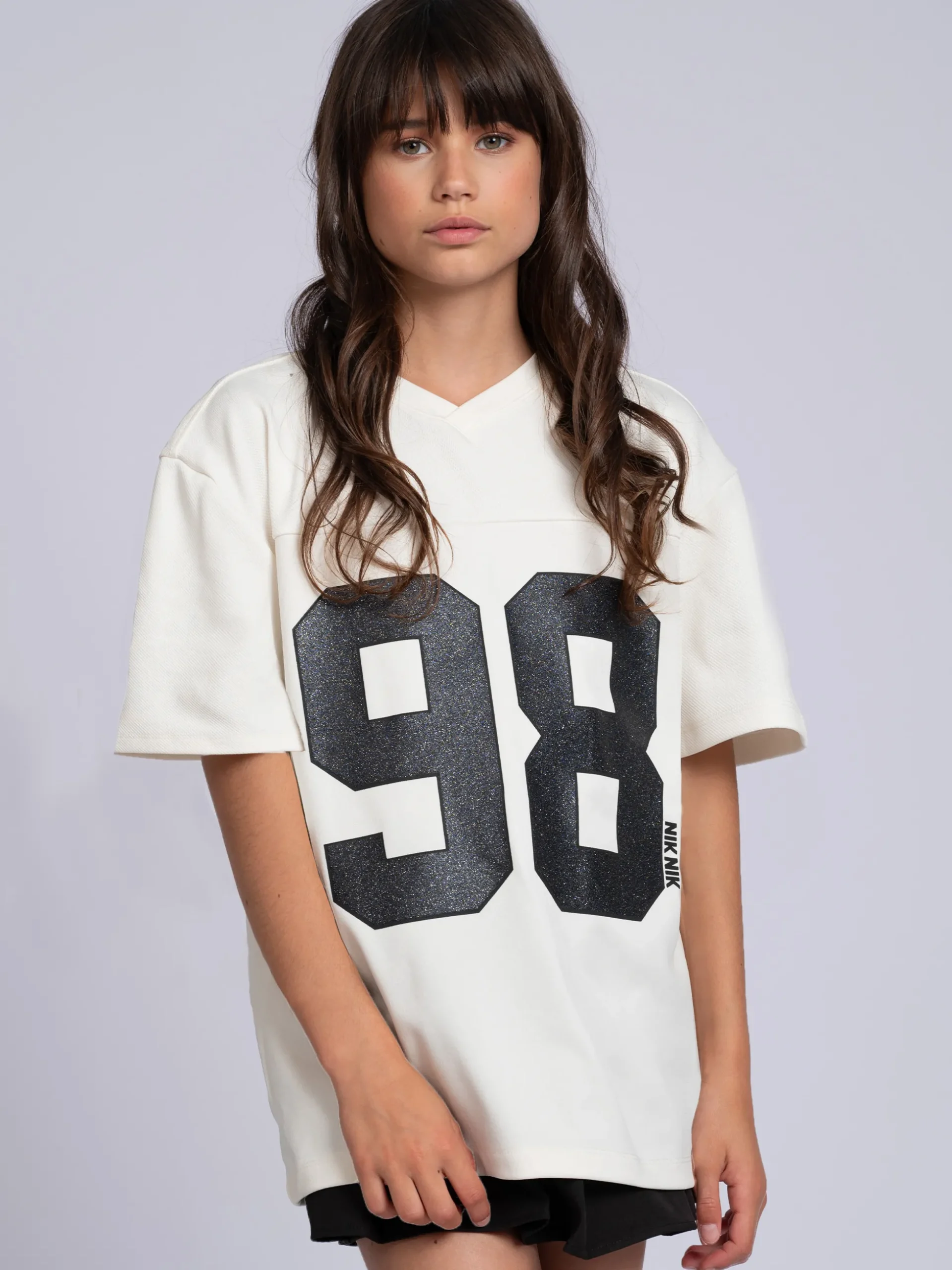 Losvallend varsity T-shirt met grafische print