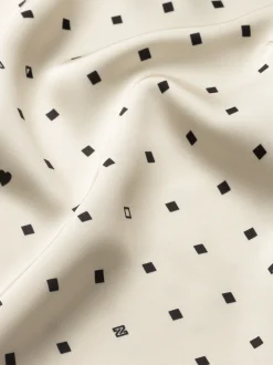 Losvallende blouse met all-over print