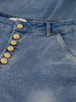 Losvallende jeans met rij knopen