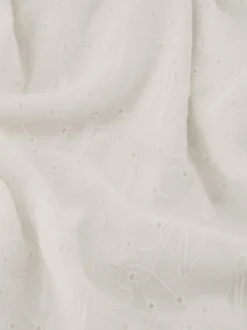 Maxi blousejurk van broderie anglaise met strikceintuur