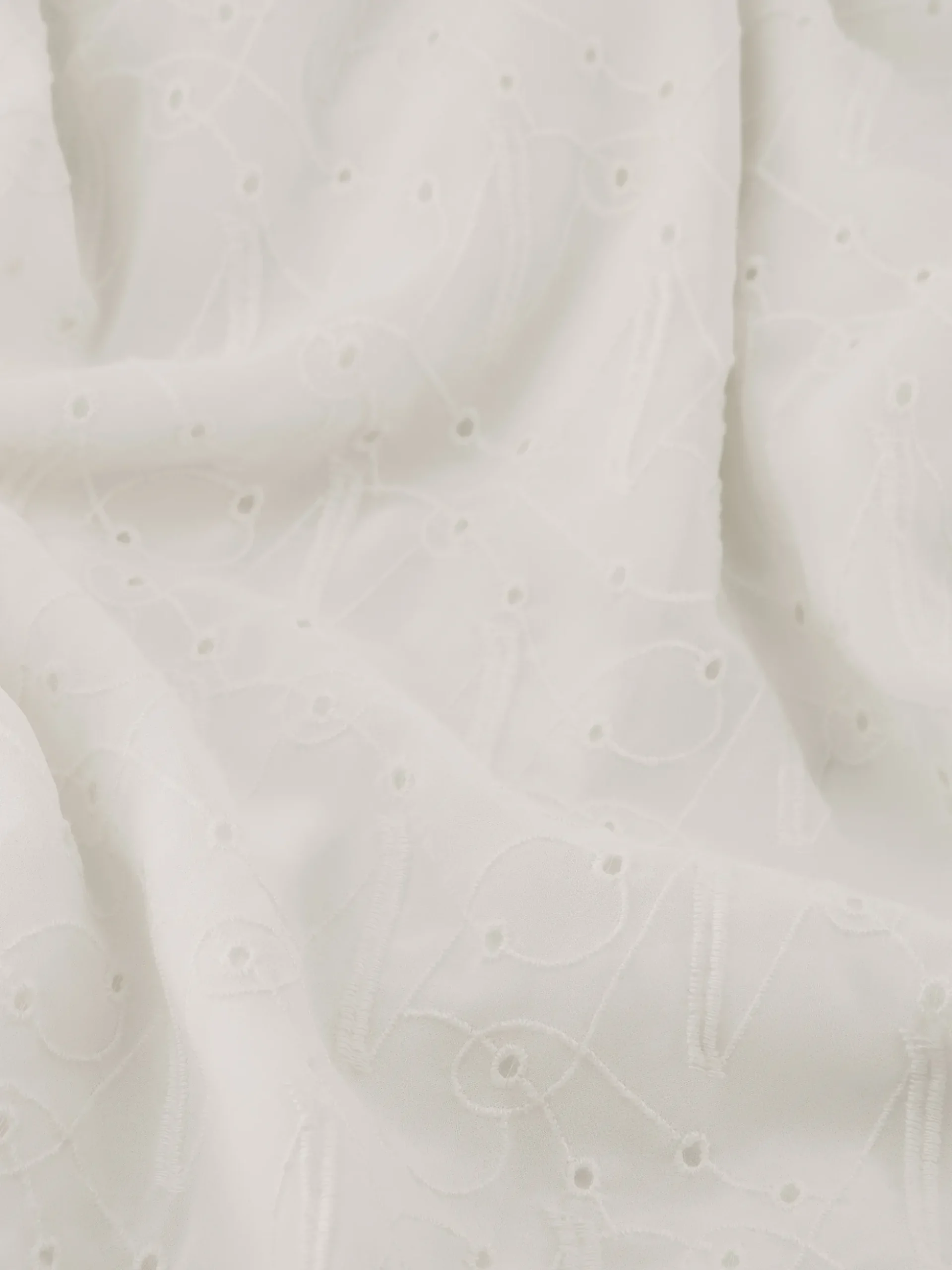 Maxi blousejurk van broderie anglaise met strikceintuur