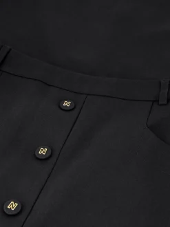 Maxi rok met N-knopen en centrale split