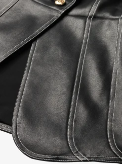Mouwloos gilet van imitatieleer met witte stiksels