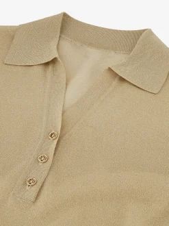 Polo top met glitters en N-knopen