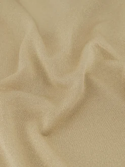 Polo top met glitters en N-knopen