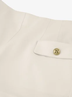 Short met omgeslagen pijpen en klepzakken