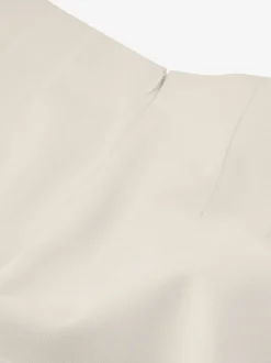 Short met omgeslagen pijpen en klepzakken