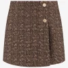 Skort met logo patroon en sierknopen