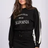 Sweater jurk met tekst en strepen detail
