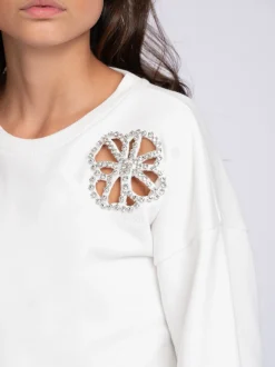 Sweater met bloemvormige uitsnede en strass-details