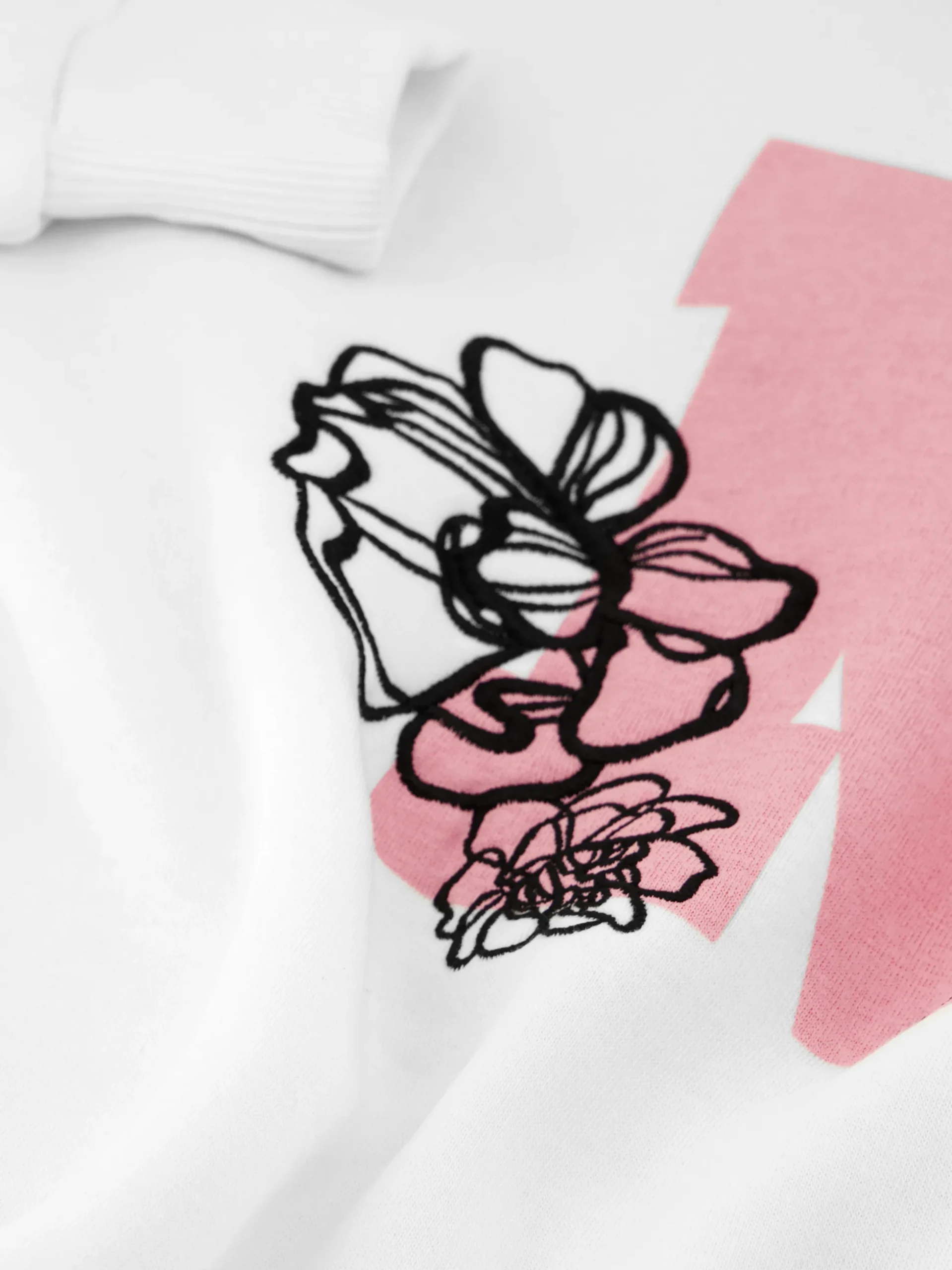 Sweater met grafisch logo en bloemenprint
